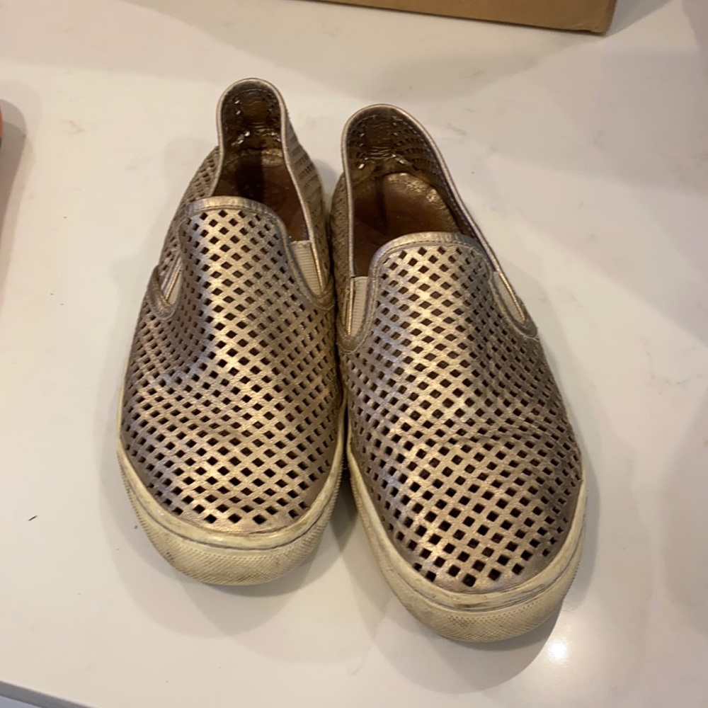 Tory Burch gold perforated sneakers